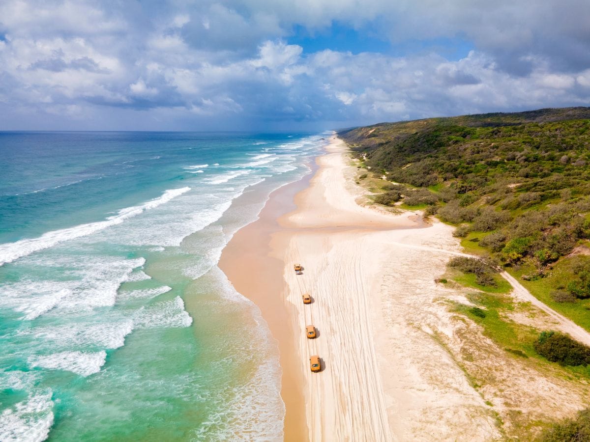 Aerial view of a long surf beach on Australia's East Coast