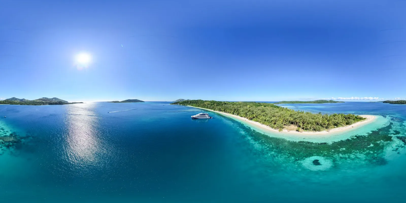 Aerial view of the Blue Lagoon, with the ship anchored off Nanuya Lailai