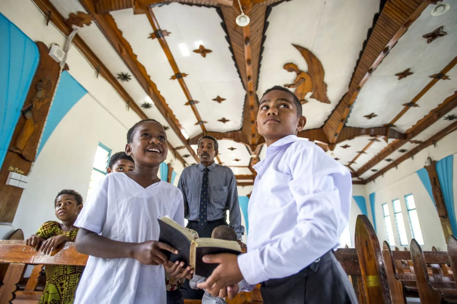 Villagers singing at a Sunday church service in a Yasawa village